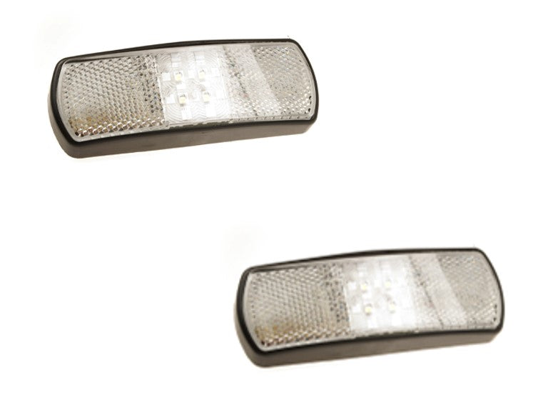 A Pair of Superseal Clear Front Marker Lights & Brackets